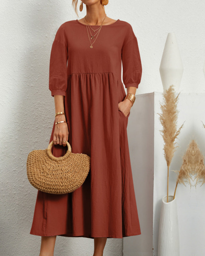 Women's plain A-line midi dress with round neck, 3/4 sleeves and side pockets