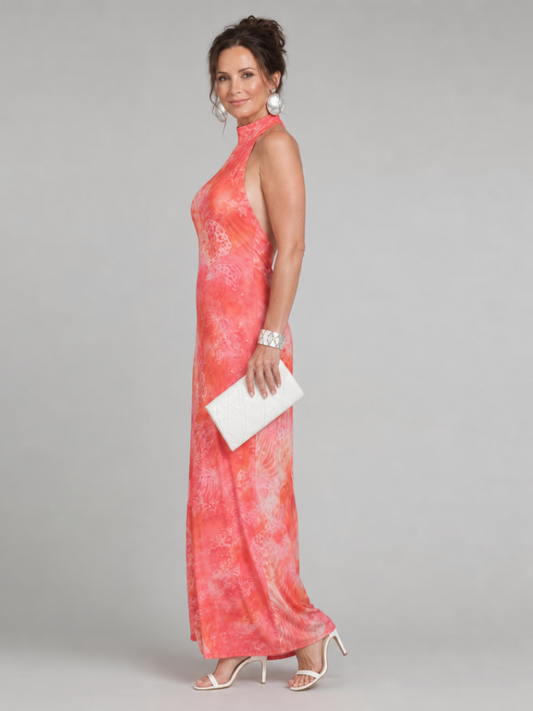 Women's orange abstract halter maxi dress with sleeveless cut and floor-length hem
