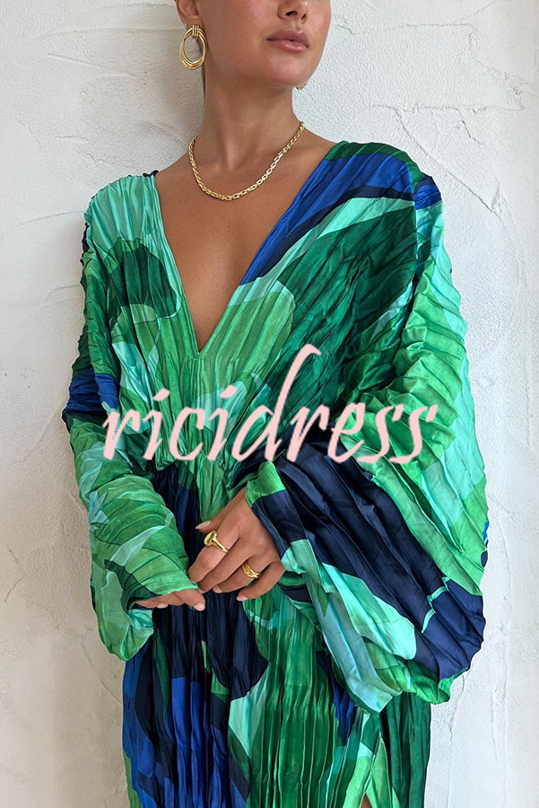 Women's green abstract print maxi dress with V-neck, kimono sleeves and front split