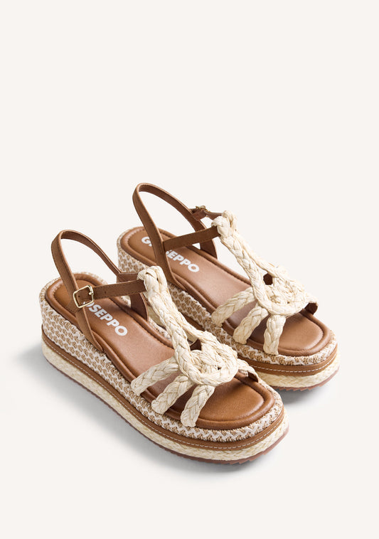 Women's brown wedge sandals with braided straps and ankle buckle