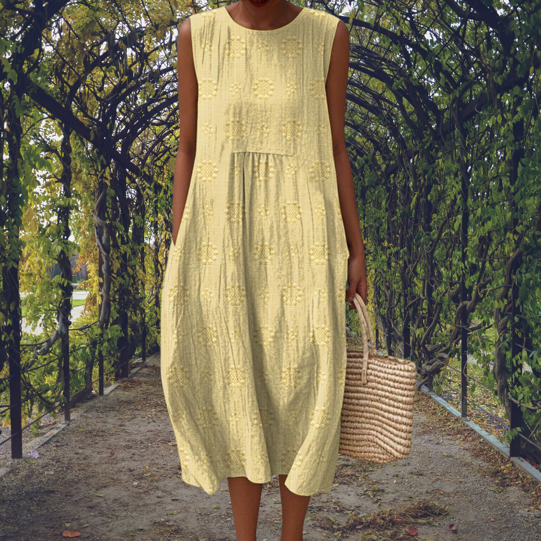 Women's sleeveless floral midi dress with round neckline and side pockets