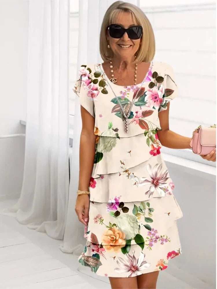 Women's apricot floral tiered dress with scoop neckline and short sleeves
