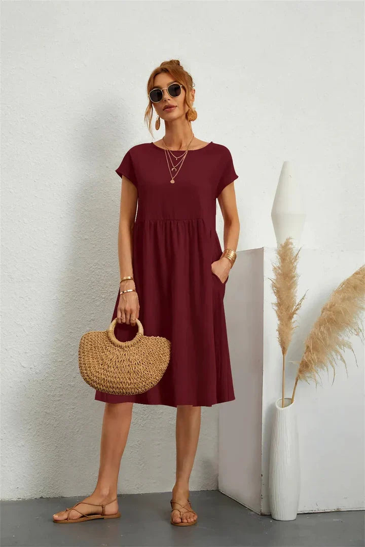 Women's plain gathered midi dress with cap sleeves and side pockets