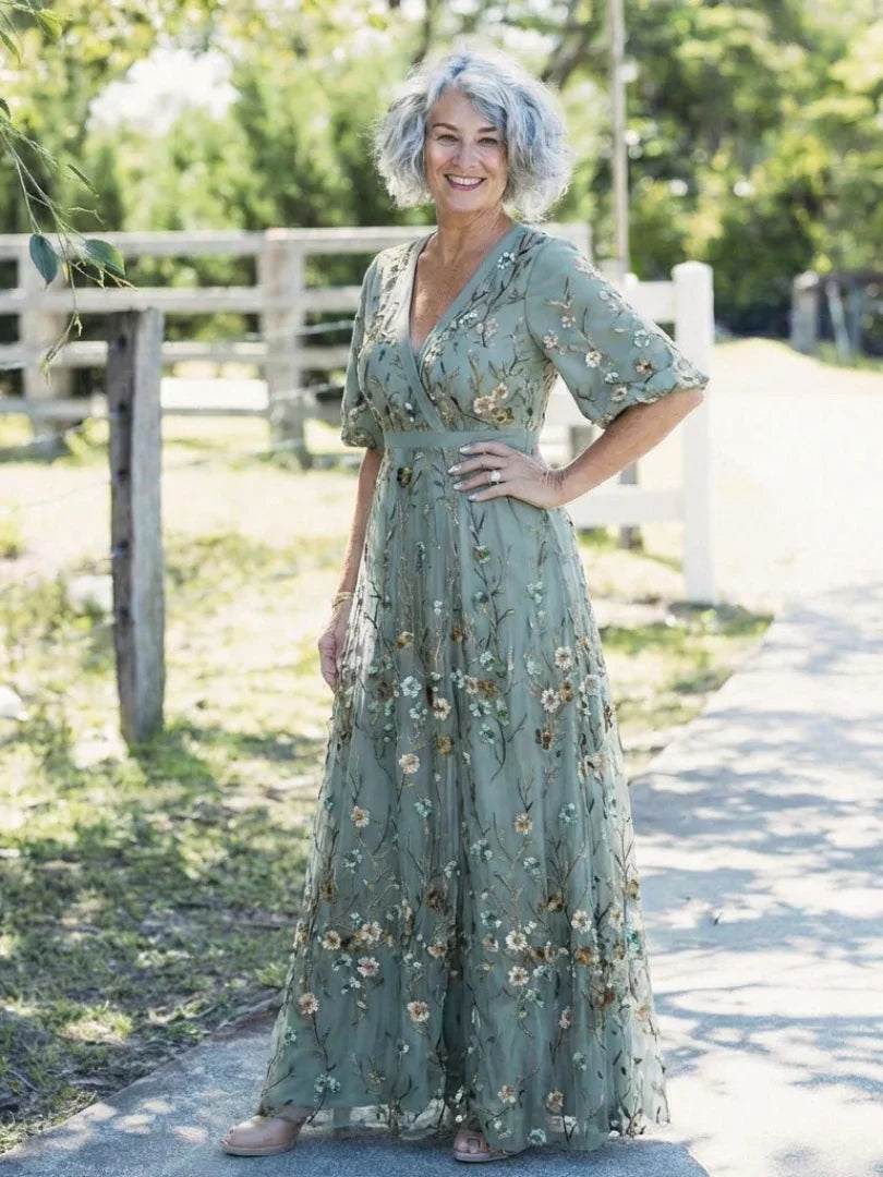 Women's green floral wrap maxi dress with V-neck and short sleeves
