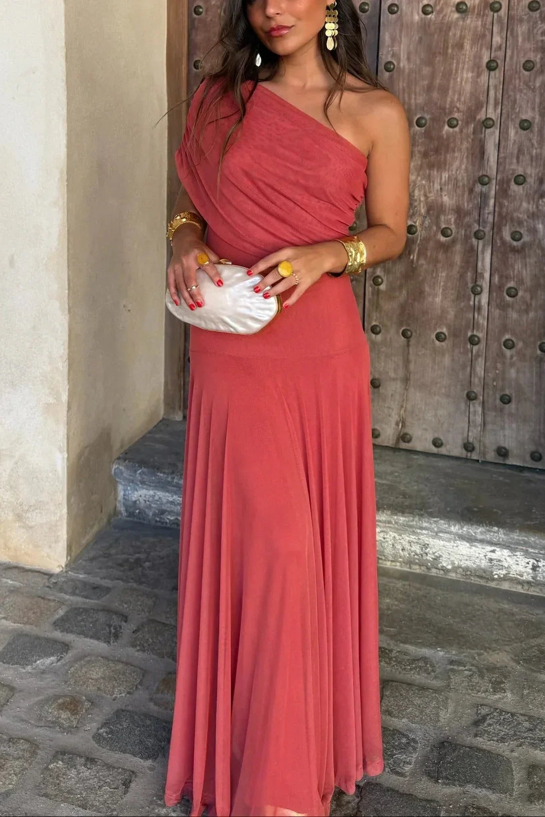 Women's pleated one-shoulder maxi dress with draped bodice and flowing skirt