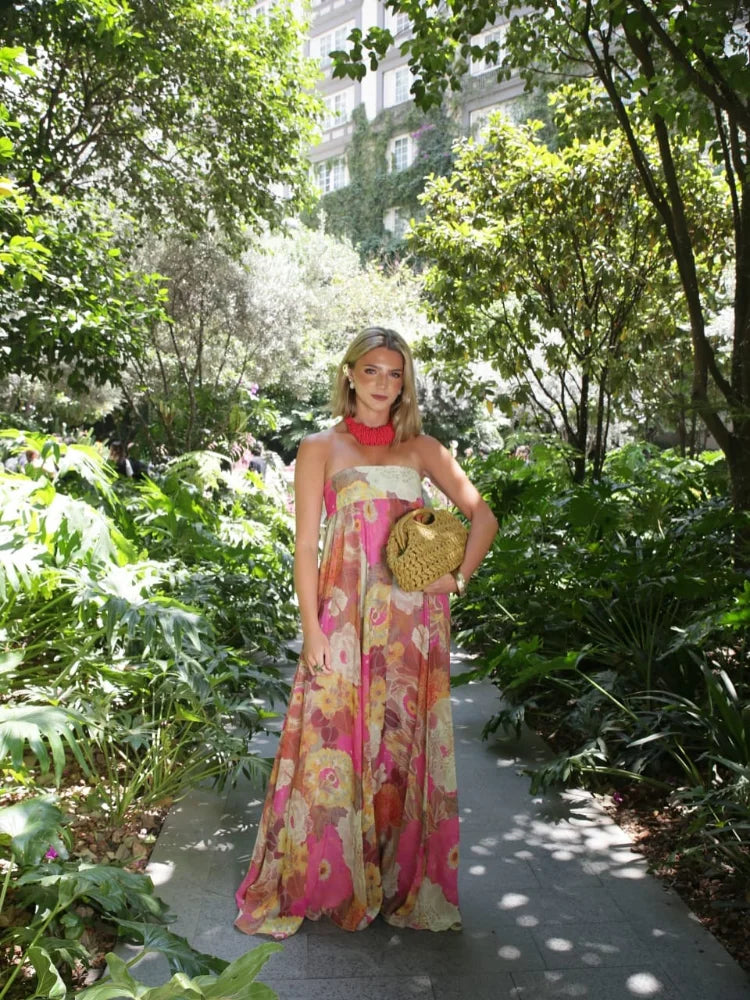 Women's strapless multicoloured floral maxi dress with flowing floor-length skirt