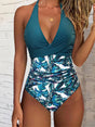 Women's one-piece swimsuit with V-neck, halter straps, ruched waist and tropical leaf print
