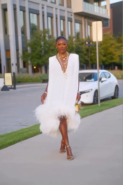 Women's white sleeveless midi dress with plunging neckline and feather-trimmed hem