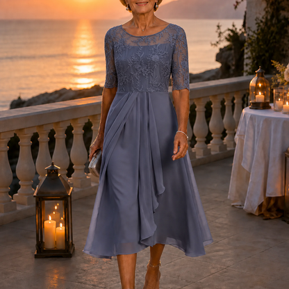 Women's floral lace bodice midi dress with three quarter sleeves and pleated ruffle skirt
