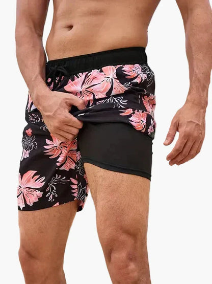 Men's tropical print swim shorts with drawstring waist and inner compression shorts