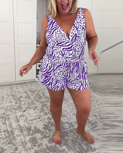 Women's sleeveless zebra print swimsuit with V-neckline and shorts