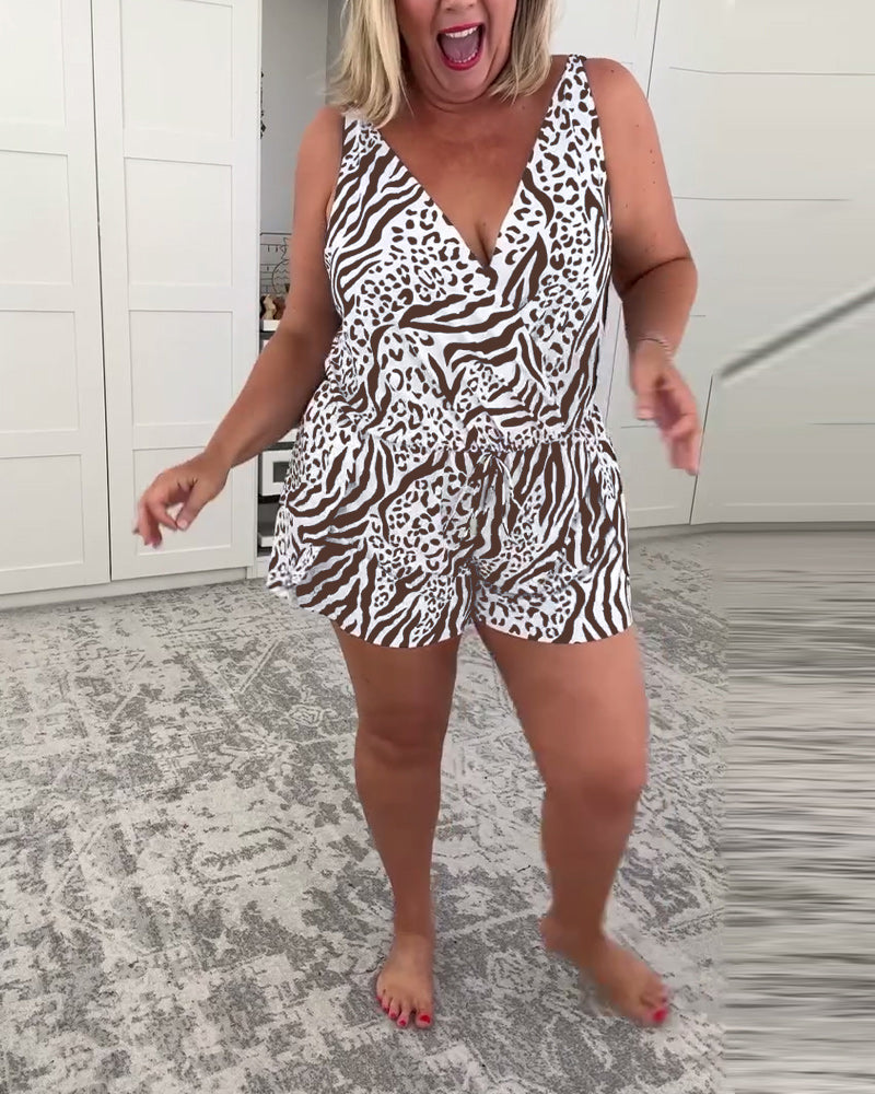 Women's sleeveless zebra print swimsuit with V-neckline and shorts