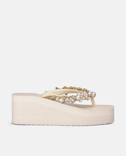 Beige platform flip-flop sandals with pearl embellishment
