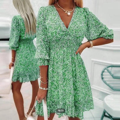 Women's floral V-neck mini dress with 3/4 sleeves and smocked waist