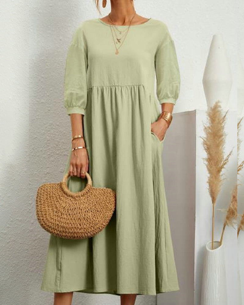 Women's plain A-line midi dress with round neck, 3/4 sleeves and side pockets