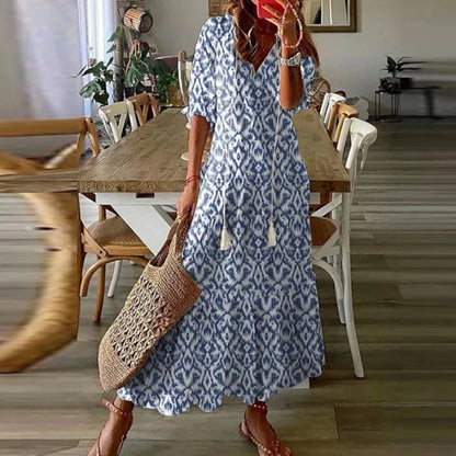 Women's floral bohemian maxi dress with short sleeves and tassel ties