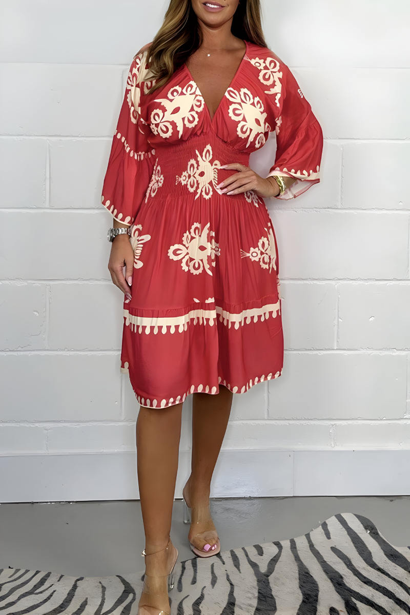 Women's floral boho mini dress with V-neckline and 3/4 sleeves