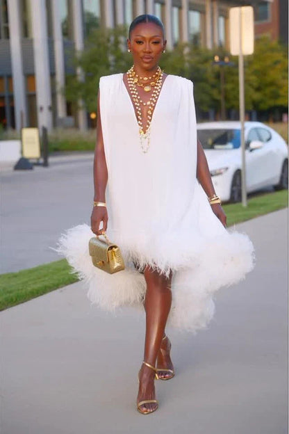Women's white sleeveless midi dress with plunging neckline and feather-trimmed hem