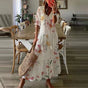 Women's floral bohemian maxi dress with short sleeves and tassel ties