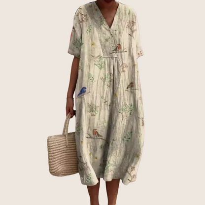 Women's floral V-neck midi dress with short sleeves and button front