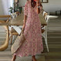 Women's floral bohemian maxi dress with short sleeves and tassel ties