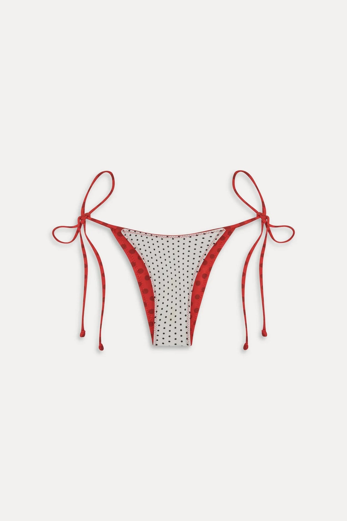 Women's reversible polka dot bikini bottoms with tie sides