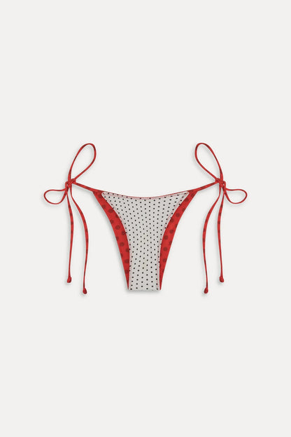 Women's reversible polka dot bikini bottoms with tie sides