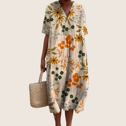 Women's floral V-neck midi dress with short sleeves and button front