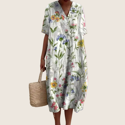 Women's floral V-neck midi dress with short sleeves and button front