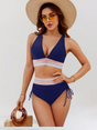 Women's high-waisted bikini set with striped trim and side ties