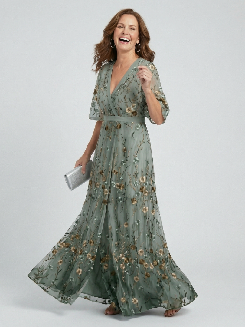 Women's green floral wrap maxi dress with V-neckline and flutter sleeves