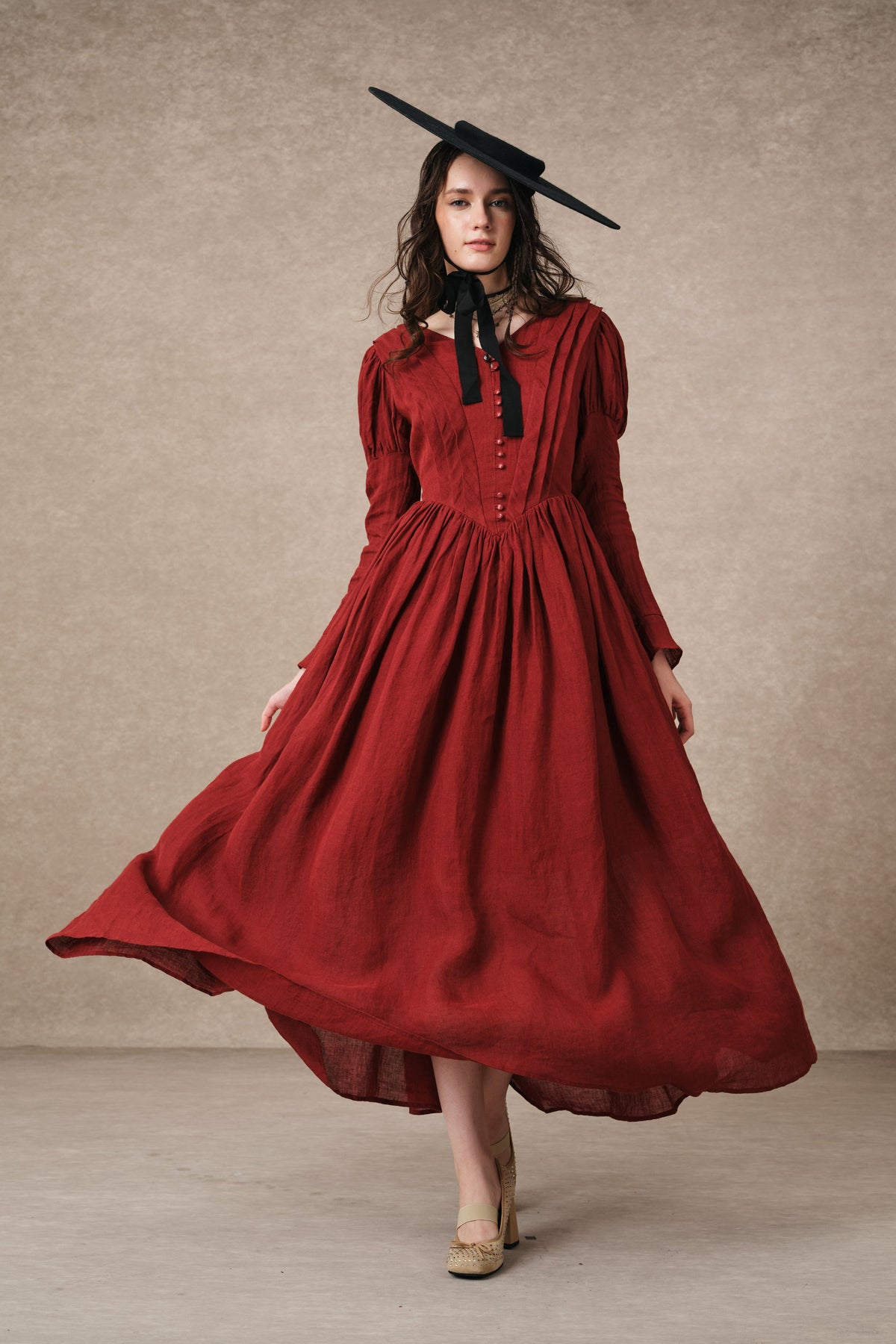 Women's tailored button-front corset maxi dress with long puff sleeves and a full gathered skirt