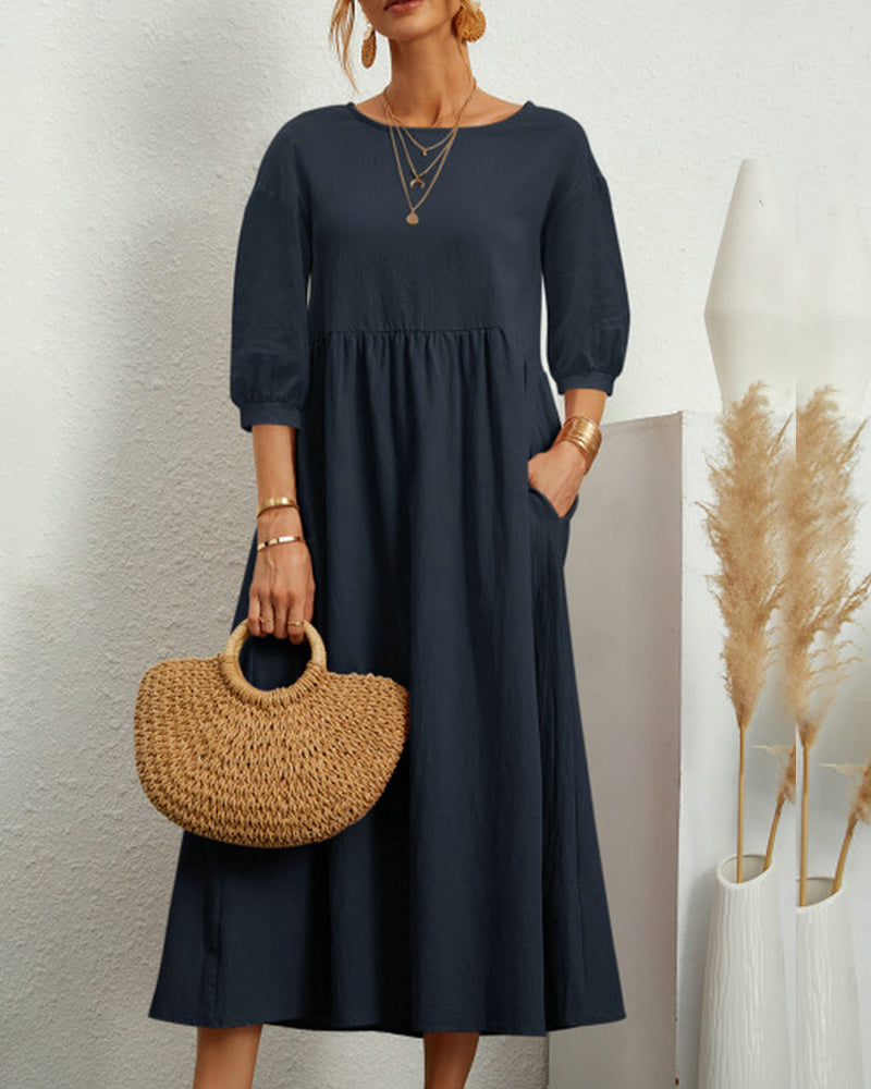 Women's plain A-line midi dress with round neck, 3/4 sleeves and side pockets