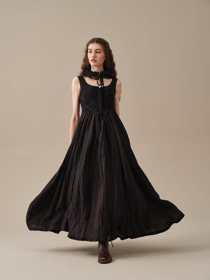 Women's sleeveless lace-up jacquard maxi dress with a fitted corset bodice and flowing skirt