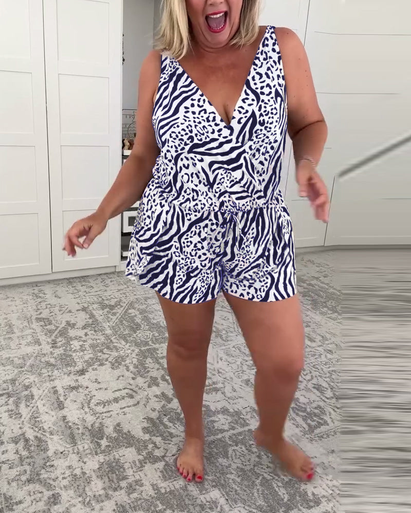 Women's sleeveless zebra print swimsuit with V-neckline and shorts