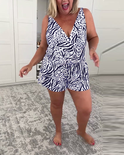 Women's sleeveless zebra print swimsuit with V-neckline and shorts