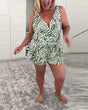 Women's sleeveless zebra print swimsuit with V-neckline and shorts