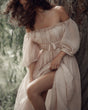 Women's pale pink off-shoulder maxi dress with puff sleeves and tie waist