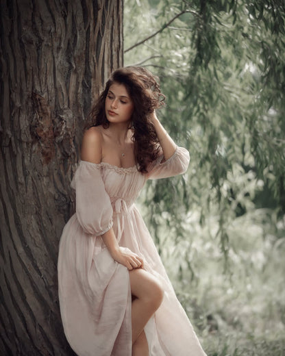 Women's pale pink off-shoulder maxi dress with puff sleeves and tie waist