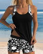 Women's floral two-piece swimsuit with sleeveless top and patterned shorts
