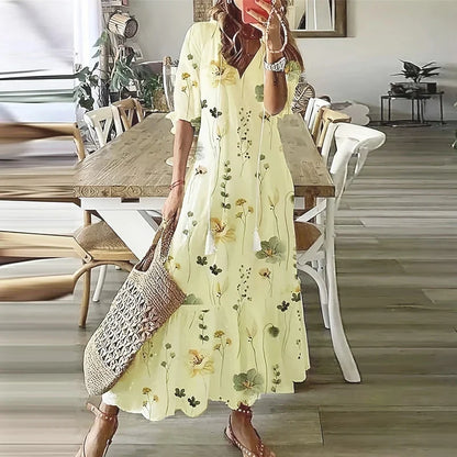Women's floral bohemian maxi dress with short sleeves and tassel ties
