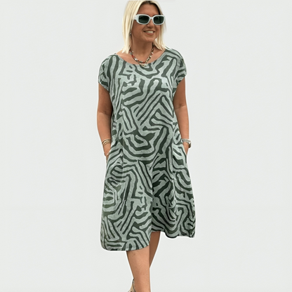 Women's abstract print midi dress with short sleeves and side pockets