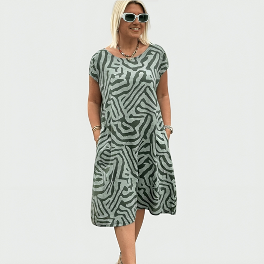 Women's abstract print midi dress with short sleeves and side pockets