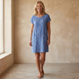 Women's plain short shift dress with round neck, short sleeves and front pockets