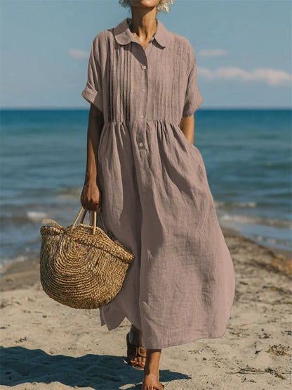 Women's collared button-front midi dress with short sleeves and side pockets