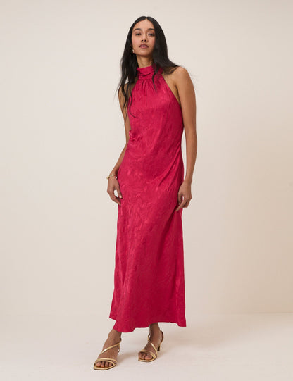 Women's pink sleeveless halter maxi dress with high neck and textured finish