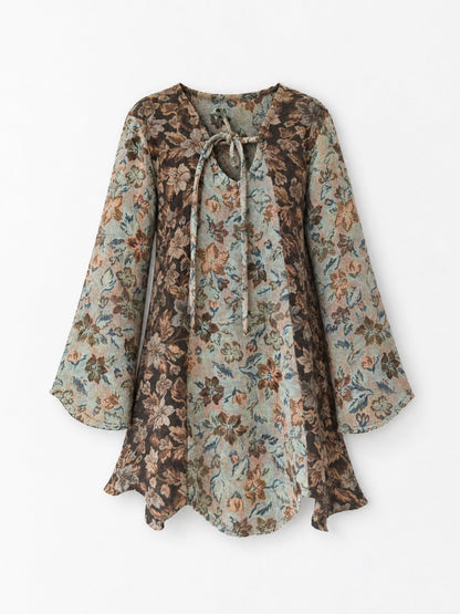 Women's floral patchwork mini dress with long flared sleeves and front tie neckline