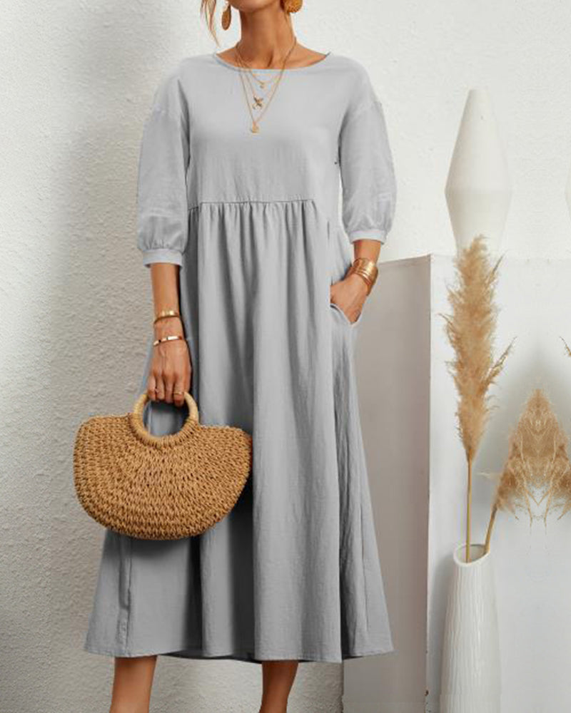 Women's plain A-line midi dress with round neck, 3/4 sleeves and side pockets