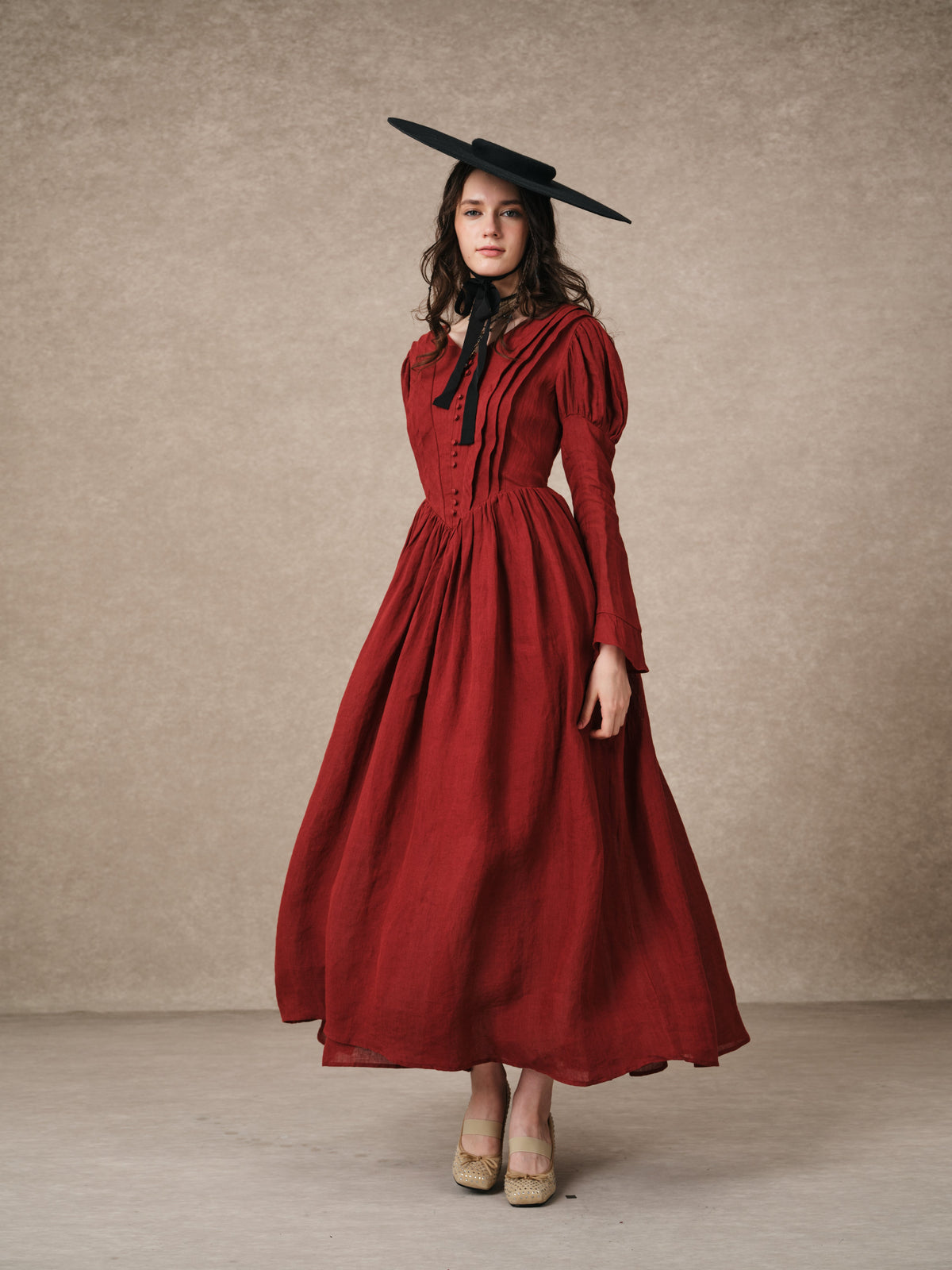 Women's tailored button-front corset maxi dress with long puff sleeves and a full gathered skirt