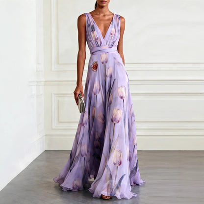 Women's sleeveless floral wrap maxi dress with a V-neckline and flowing full-length skirt